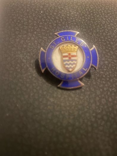 Giles silver nurses badge