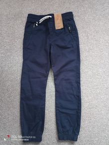 New.boys light trousers .age 7/8