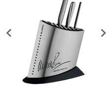 Global knife block and 3 knives brand new in box.