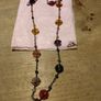 is a bohemian-style wire-wrapped beaded necklace Image 3
