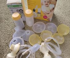 Medela/ Haakaa Breast Pump