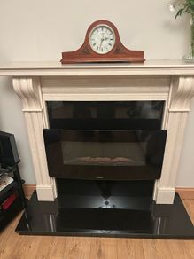 marble fireplace and electric fire