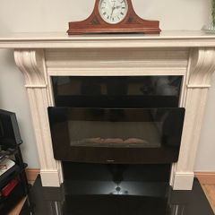 marble fireplace and electric fire