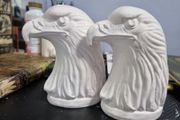 Pair of plaster eagle ornaments