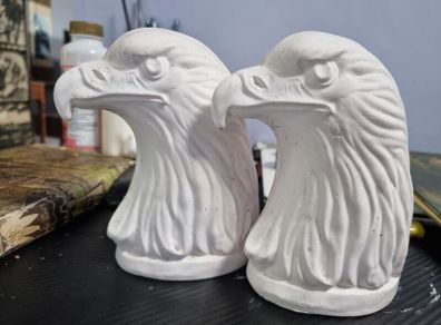 Pair of plaster eagle ornaments