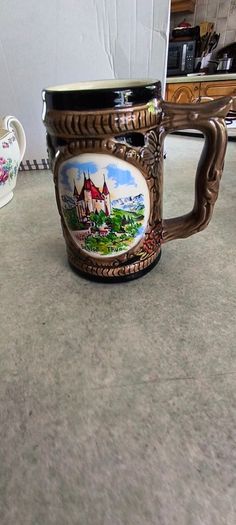 3 ITMEMS OF POTTERY-  1- Angel White Resin Holy Water Font - 6 Inchs 22.00 EURO. 2- Vintage Cotfer 5 inchs Swiss Alps Lucerne Beer Stein 35.00 euro. 3- Vintage Wedgwood-Harmony Rose- Sauce Boat 18.00 euro.