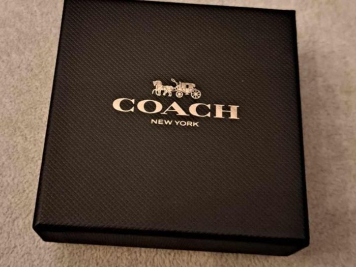 Coach stud earings