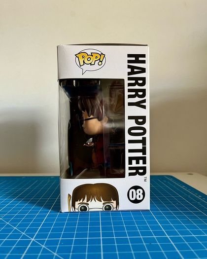 Harry Potter in Quidditch Robes #08 - Harry Potter - Movies - Funko Pop