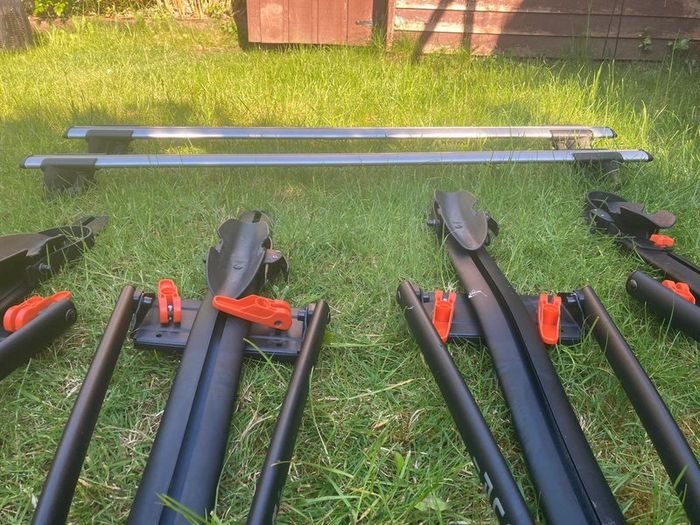Roof bars and roof mounted bike rack carriers