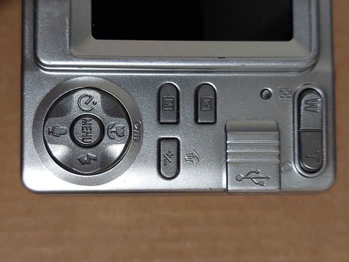 Z880 Digital Camera, Takes 2AA Batteries, working fine, has a modification that doesn't affect its performance