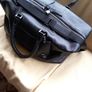 Kenneth Cole Large Black Leather holdall With Habdles And Shoulder Strap. and Image 2