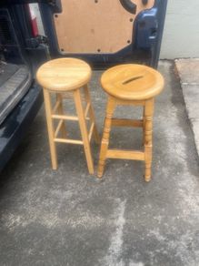 2 solid wood bar stools.
