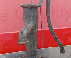old whiskey barrel pump