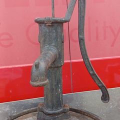 old whiskey barrel pump