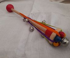 Child's wooden rattle with bells