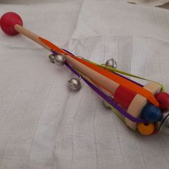 Child's wooden rattle with bells