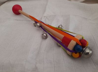 Child's wooden rattle with bells