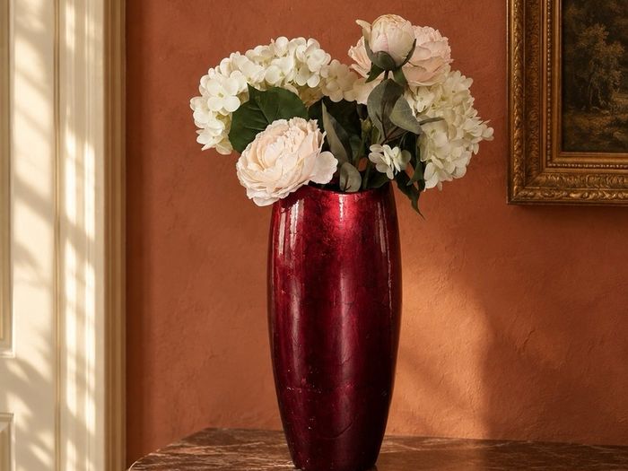 Elegant decorative vase with artificial flowers