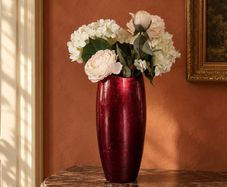 Elegant decorative vase with artificial flowers