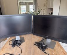 dell 23 inch Monitors built in speakers - see images for ports working perfect 45e for both - will not sell separately.