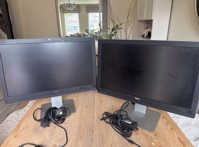 dell 23 inch Monitors built in speakers - see images for ports working perfect 45e for both - will not sell separately.