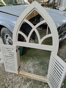 garden window with mirror & shutters
