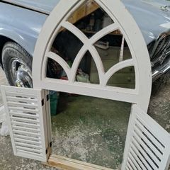 garden window with mirror & shutters