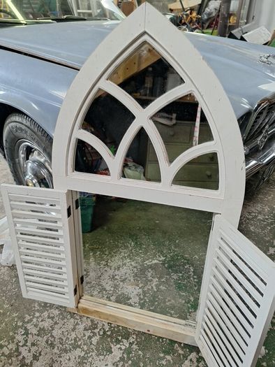 garden window with mirror & shutters