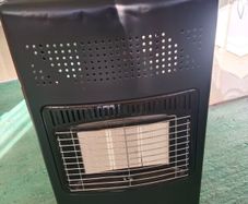 Kingavon Gas heater with cylinder and gas bottle ( The bottle is empty).