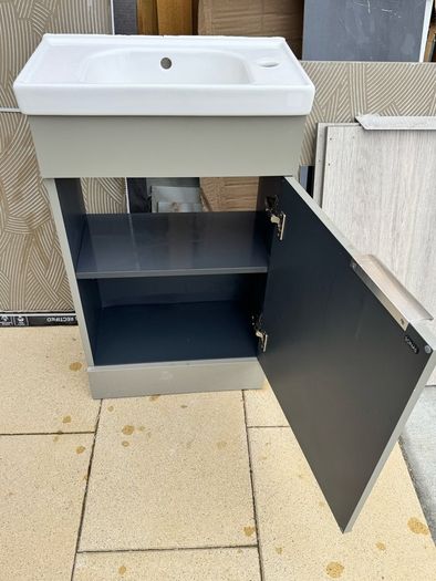 Narrow Sink Along With Vanity Unit And Pipes; Kitchen Sink And Quartz Worktop Unit With Wooden Inparts