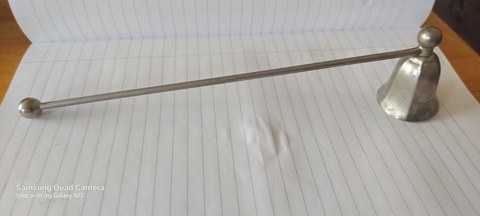 Candle metal snuffer ,,good patina for its age ,sold as seen