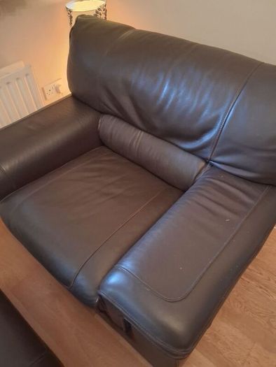 Leather armchair with matching footstool