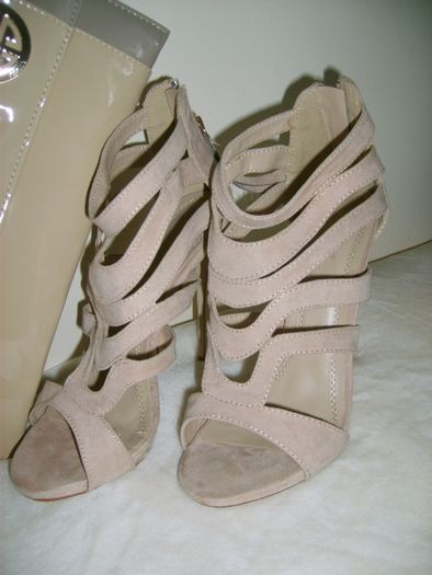 Nice shoes and a handbag .
