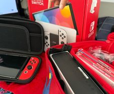 Nintendo Switch OLED Mint Condition Full Bundle (Like New)