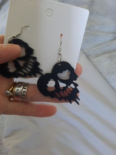 melting skull heart earrings