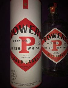 Powers whiskey bottle with box
