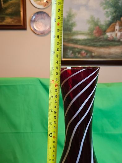 Elegant Murano-style vase made of art glass in ruby red with white spiral stripes