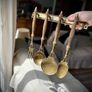 French vintage solid brass and wooden kitchen utensils Image 3