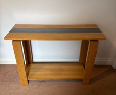 Solid wood wall table with leather and glass insert detail