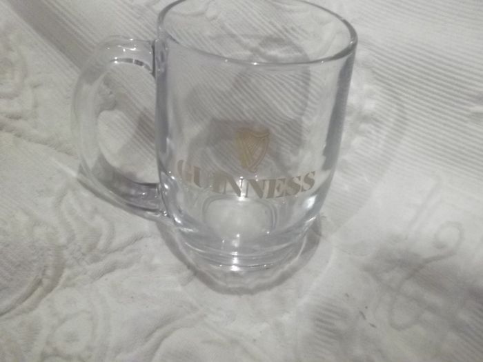 a vintage half point guinness glass made by waterford glass