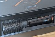 Rotating brush hair dryer