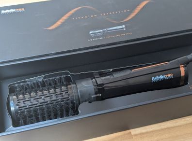 Rotating brush hair dryer