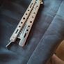 Old Penknife and Steel Butterfly Comb for sale as a lot Image 6
