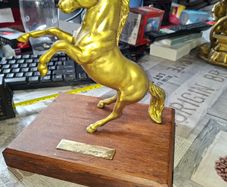 Beautiful Heavy Brass Rearing Horse Sculpture Mounted on a Wooden Base, Commemorating a Winner of a Gold Cup The engraved text indicates an event date of October 15, 1992 15.10.92, Postage Available