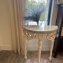 ornate half-moon console table with a granite top Image 8