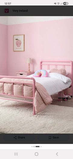 Pink metal frame toddler bed