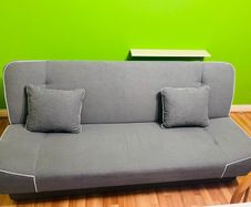 Light grey foldable sofa