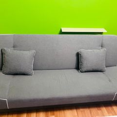 Light grey foldable sofa