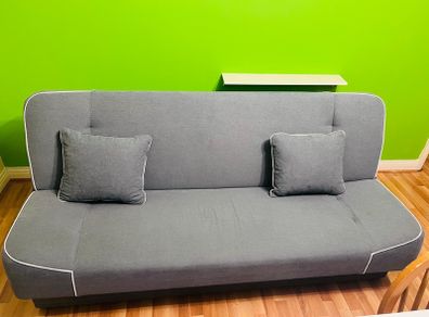Light grey foldable sofa