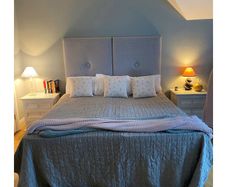 Either 3 single beds or 1 superking and 1 single with headboards
